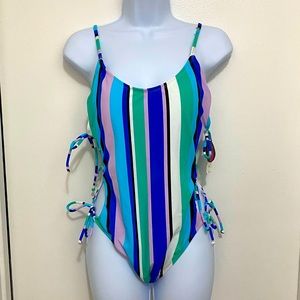 Triple side tie bathing suit. Very cute! Brand new. Never worn.Perfect condition